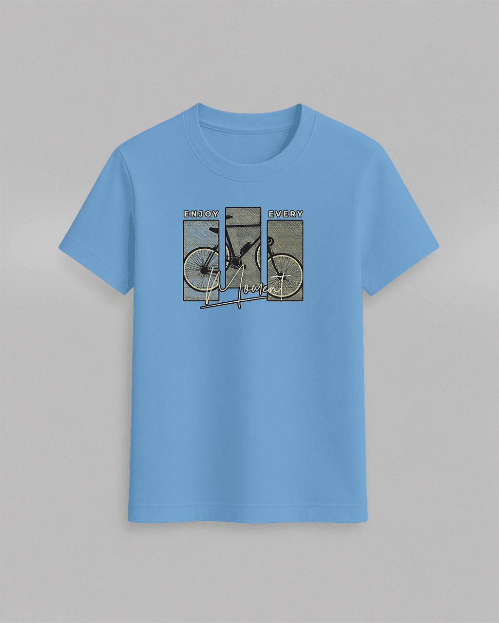 Bike T-Shirt in light blue cotton featuring a stylish graphic of a bicycle with text 'ENJOY EVERY moment' in multicolor blocks
