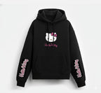 Girls Hello Kitty Hoodie in black cotton with pink Hello Kitty face on chest and text on sleeves