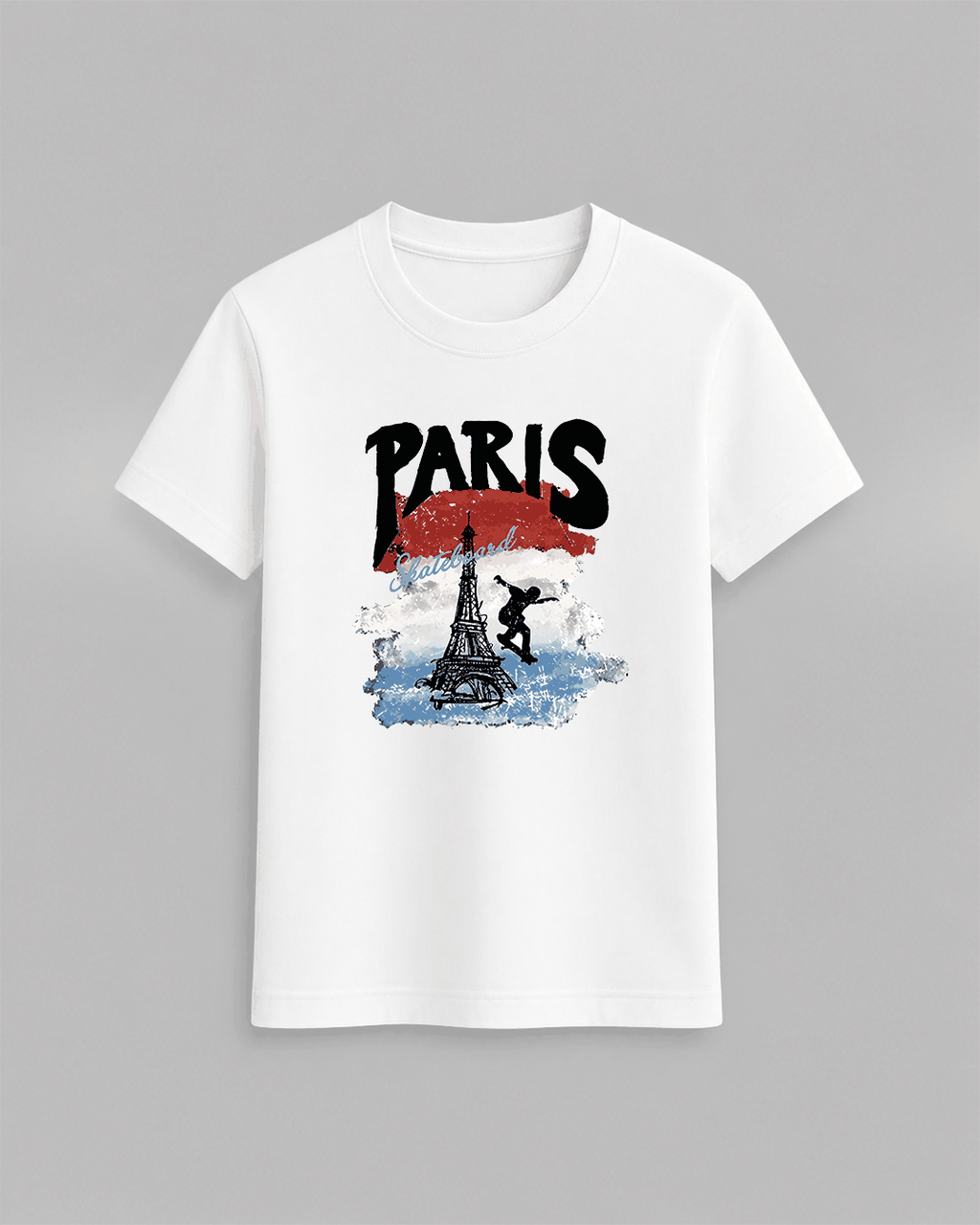White Paris Skateboard Graphic T-Shirt with Eiffel Tower and skateboarder silhouette in red, white, and blue print