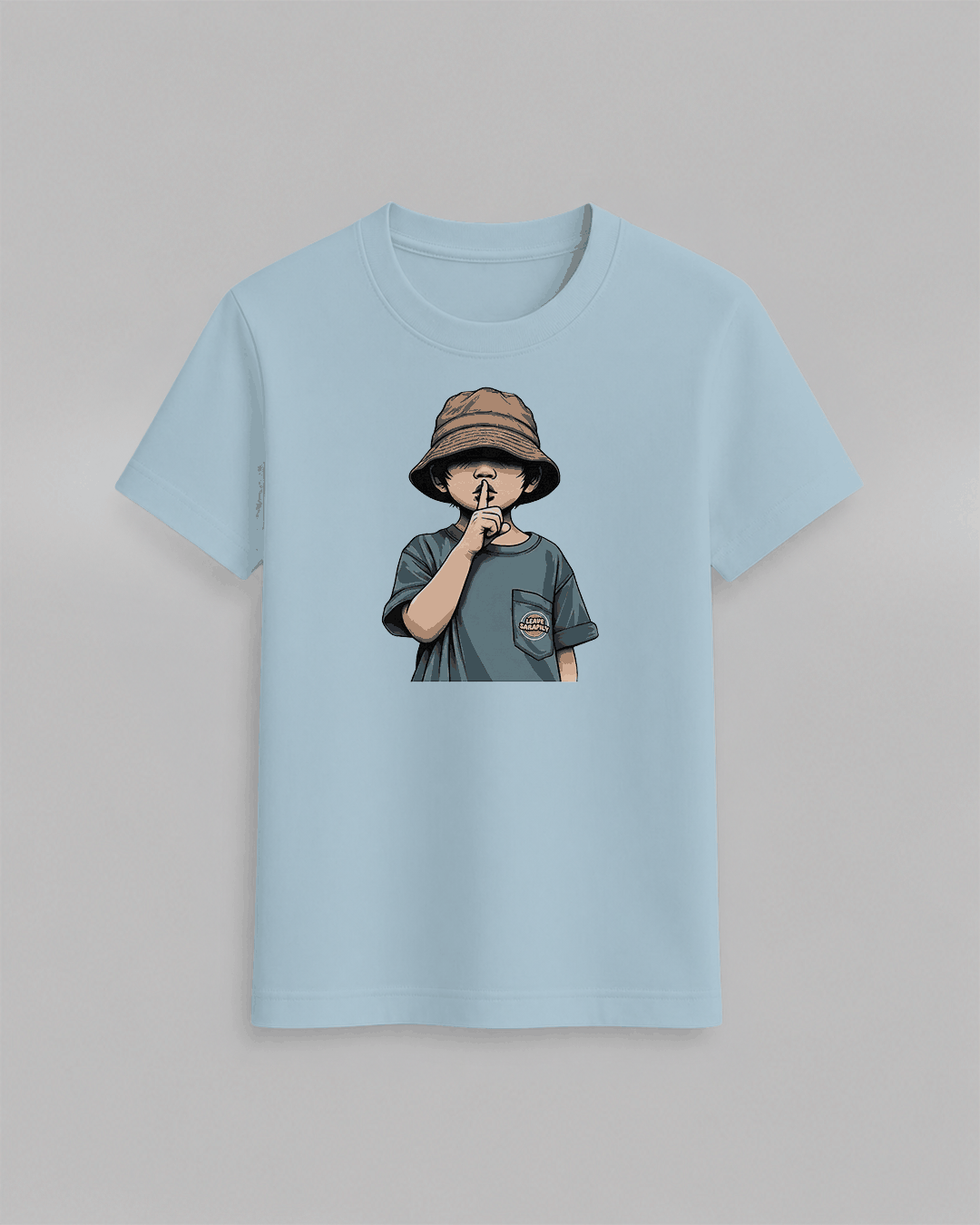 The cap boy T-Shirt in light blue cotton featuring a graphic of a boy wearing a brown bucket hat with finger to lips gesture