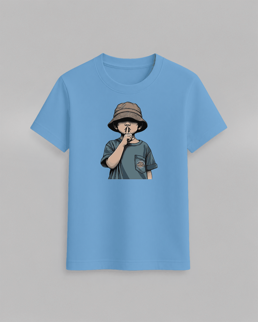 The cap boy T-Shirt in light blue cotton featuring a graphic of a boy wearing a brown bucket hat with finger on lips