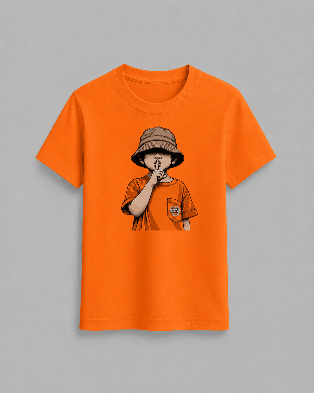 The cap boy T-Shirt in bright orange cotton featuring a graphic of a boy in a brown hat holding a finger to his lips