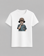 The cap boy T-Shirt in white cotton featuring a graphic of a boy in a brown cap making a shushing gesture